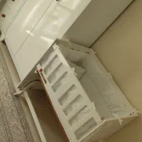 تخت نوزاد کنار مادر