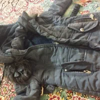 کاپشن|کفش و لباس بچه|قم, قلعه کامکار|دیوار