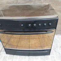 اجاق گاز ۵ شعله وفردار وجوجه گردان تکنو
