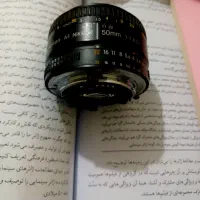 لنز نیکون|دوربین عکاسی و فیلمبرداری|تهران, فلسطین (میدان انقلاب)|دیوار