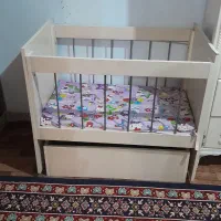 گهواره تخت کنار مادر