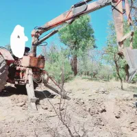 تراکتور رومانی با بیل اطلس عقب و کدول جلو