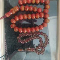 تسبیح کهربا پرچمی و آب حیات قابل معاوضه