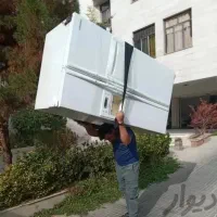 کارگر حمل یخچال ساید بای ساید و مبلمان