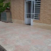 فروش یک باب منزل مسکونی ویک قطعه زمین مسکونی