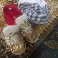 کفش و کلاه نوزادی