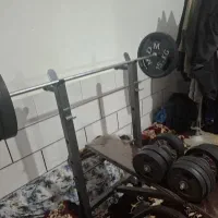 میز پرس به همراه ۹۰ کیلو وزنه