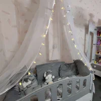 تخت گهواره ای و کنار مادر همراه با تشک
