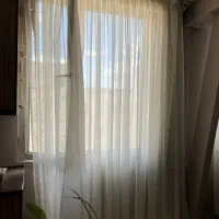 چند تیکه حریر درجه یک و آستر پشت پرده دوخته شده