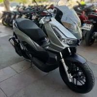 همتاز adv