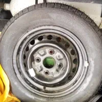 یک حلقه لاستیک یزد تایر با رینگ نو