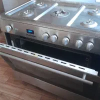 اجاق گاز پنج شعله گازی اسنوا با فر و جوجه گردان