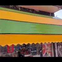 قفسه و چادر ۴متری بالا سر مغازه