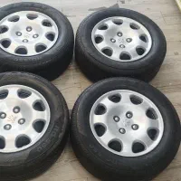 رینگ و لاستیک زیر صفری پژو 205/60/14 رازی پهن