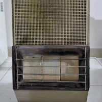 بخاری قدیمی کپسولی و گاز شهری اونیورسال