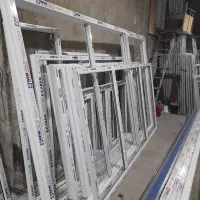 تولید درب پنجره دوجداره UPVC و توری پلیسه ای