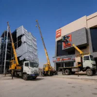 خدمات جرثقیل دکل بلند و کفی بالابر مصالح و سبد نفر
