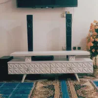 زیر تلویزیون به همراه پرده و سینما خانواده