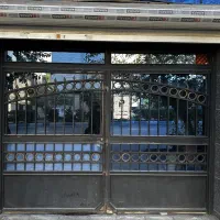 درب آهنی پارکینگ سنگین و سالم