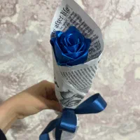 گل ربانی تک شاخه با کاغذ پیچ