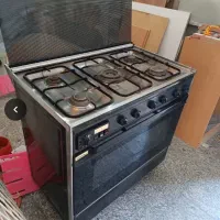 اجاق گاز و توری پنجره