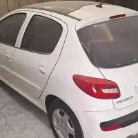 پژو ۲۰۷ اتومات سفید سقف شیشه ی ۱۲۰۰۰کار بهمن ۱۴۰۳