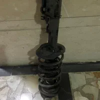 کمک فنر و‌ توپی چرخ عقب و چراغ سپر عقب دیگنیتی
