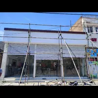 اجرای نمای کامپوزیت کرکره برقی وجک بازویی