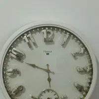 ساعت. گلدان. تابلو
