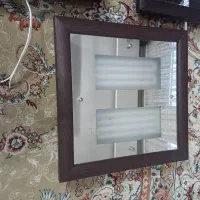 تعدادی چراغ سقفی ال ای دی طرح چوب وآینه