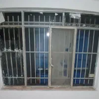 پنجره درب آهنی