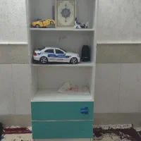 دراور و کتابخانه و میز تلویزیون