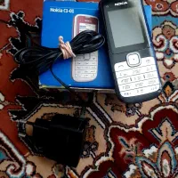 گوشی نوکیا مدل c1 اصلی با قوطی شارژر
