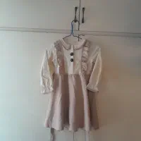 لباس کودک و کوله پشتی