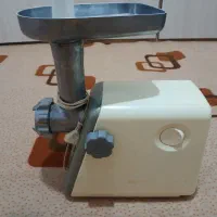 چرخ گوشت ناسیونال وبخارپز