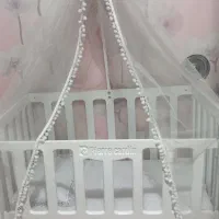 تخت و گهواره کنار تخت مادر نو