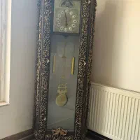 آینه و شمعدانی بوفه .ساعت