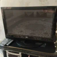 تلویزیون ۳۲ اینچ ال جی و میز تلویزیون شیشه ای سالم