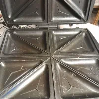 ساندویچ ساز قاب رو دستگاه ترک خورده
