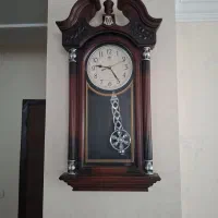 ساعت دیواری طرح چوب