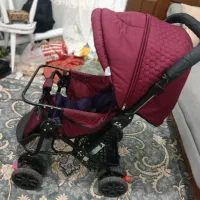 دوتاکالسکه تمیز و درحدنو و تاب گهواره قیمت ۴۰۰ پتو