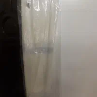 پرده توری شسته اتو شده تمیز