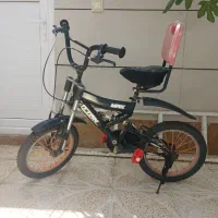 دوچرخه ۱۶ کمک دار