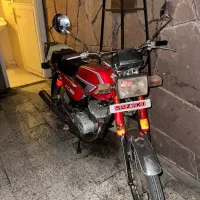 سوزوکی ax100