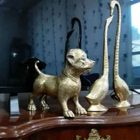 قوی عاشق وسگ برنزی