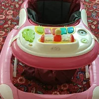 روروئک ولباس بچه در حد نو