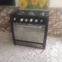 اجاق گاز ۵و سه شعله  سالم کفی تخت  یک نفره استکان