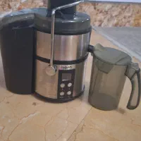 ابمیوه گیری با مخزن تفاله گیر