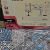 چرخ خیاطی وپلو‌پز پلم