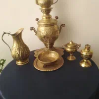 سرویس برنجی وزن 3کیلو و740 گرم هست